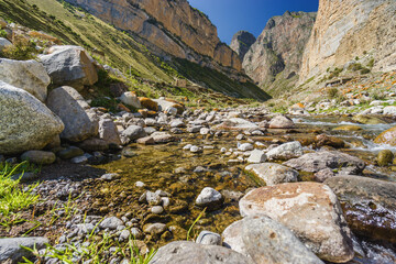 Sunny view of  mountains and Eltyulbyu village in North Caucasus, Kabardino-Balkaria, Russia.