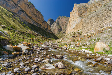 Sunny view of  mountains and Eltyulbyu village in North Caucasus, Kabardino-Balkaria, Russia.