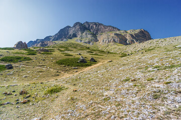 Sunny view of  mountains and Eltyulbyu village in North Caucasus, Kabardino-Balkaria, Russia.