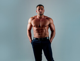 Fototapeta premium Shirtless athletic naked guy. Handsome masculine man.