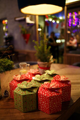 boxes with New Year's gifts at the Christmas party