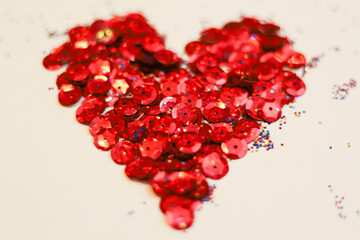 Red sequins in the shape of a heart