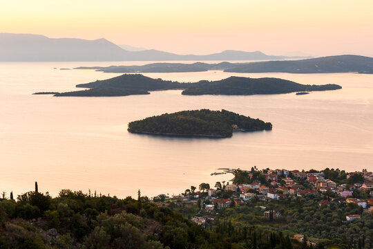 Morning view of Nydri village on Lefkada island and several islands.