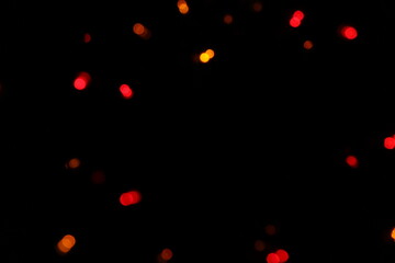 Bokeh of red lights on black background