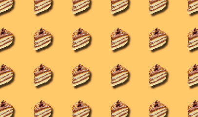 Pattern with a cut piece of homemade cake with chocolate and walnuts with shadow.