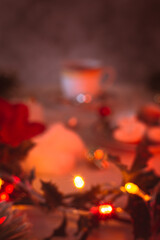 Obraz na płótnie Canvas Blurred christmas background: tea, garland