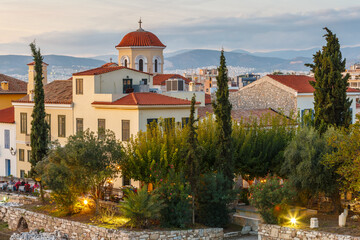 Church and neoclassical buildings in the old town of Athens, Greece.