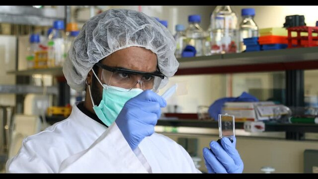 scientist looking to sample in a laboratory