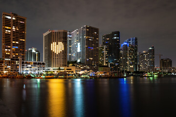 Fototapeta na wymiar Miami city night. Bayside Miami Downtown MacArthur Causeway from Venetian Causeway.