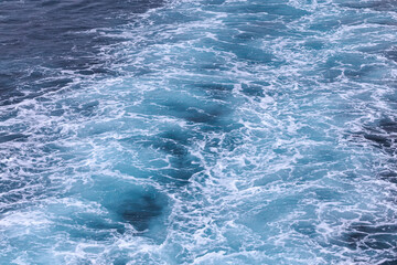 Ocean boat foam trail. A trail on the water from the ship