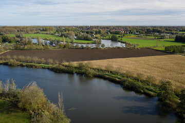 Fototapeta na wymiar Old Durme meanders, in Waasmunster, Belgium; aerial view; the town of Hamme can be seen in the background