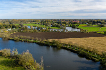 Fototapeta na wymiar Old Durme meanders, in Waasmunster, Belgium; aerial view; the town of Hamme can be seen in the background
