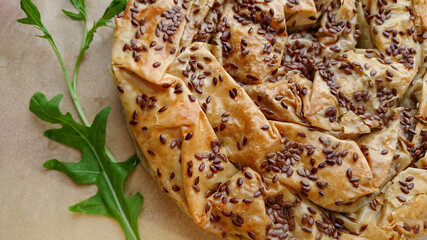 Delicious meat pie from puff pastry, which is traditionally prepared in the Balkans