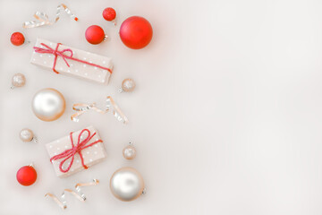 Christmas composition with gift boxes and Christmas ornaments on light background. Christmas greeting card. Christmas flat lay. stock photo