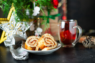 Obraz na płótnie Canvas christmas roll biscuit pastry home sweet baked cake dessert festive table new year serving healthy meal snack gift tasty top view copy space food background rustic
