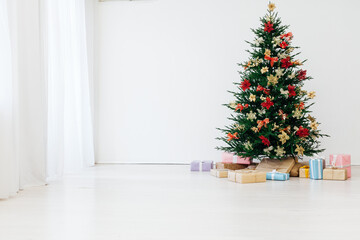 Christmas tree pine with new year gifts holiday red decoration decor