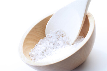 Fototapeta na wymiar Close up of salt grains on spoon