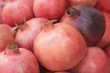 Large ripe pomegranates. Healthy autumn fruit.