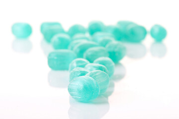 Close up of candies on white background