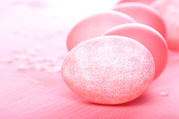 Easter eggs on pink background
