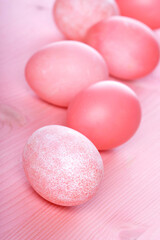 Easter eggs on pink background