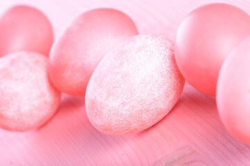 Pink easter eggs on pink background
