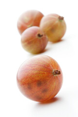 Close up of gooseberrys on white background