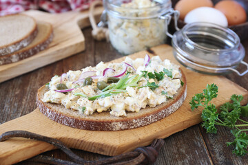 Appetizer. Scandinavian egg salad spread with anchovies, capers and red onion