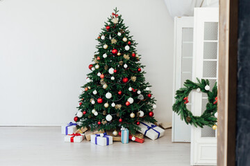 New Year's Eve Christmas tree interior with holiday decor gifts