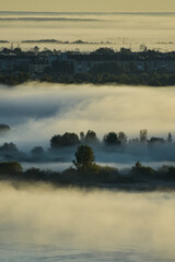 Obraz na płótnie Canvas foggy dawn over the River Volga