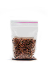 Chinese radish seeds in a package for germination on a white background