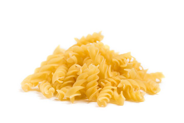 Raw Italian pasta in a heap on the table isolated on white background