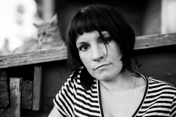 Portrait of a woman outdoors. Black and white photo.