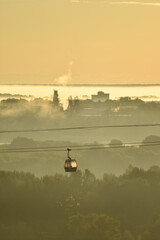 dawn over the cable car across the river