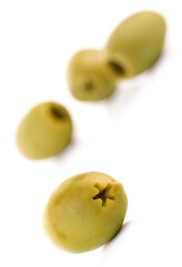 Olives on white background - close-up