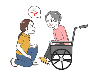 車椅子の高齢女性と会話　怒る　女性介護士