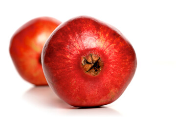 Studio shot of pomegranate fruit