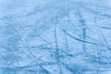 Skating rink surface with skate scratches