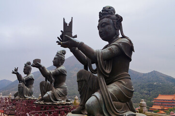 Fototapeta na wymiar Hong Kong - Statues of Worshippers by Big Buddha