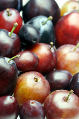 Plums on white bacground - close-up