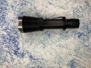 tactical flashlight with steel bezel