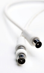 Audio and video cable on white background