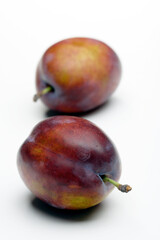 Plums on white bacground - close-up