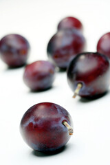 Plums on white bacground - close-up