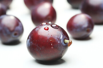 Plums on white bacground - close-up