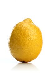Studio shot of lemon on white background