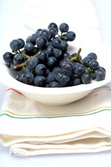 Grapes on white plate - close-up