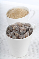 Brown sugar in white cups