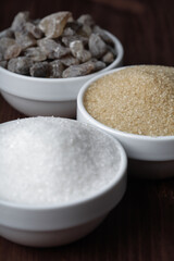 White and brown sugar in bowls