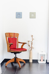 Antique red armchair isolated on white background